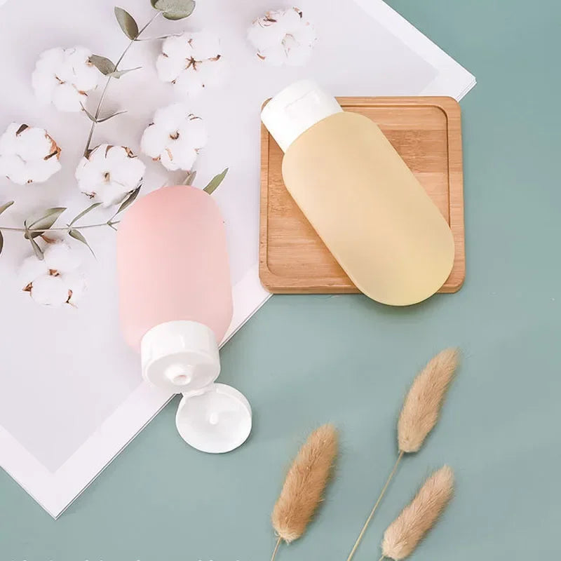 Coffret de 4 Bouteilles Rechargeables en Silicone