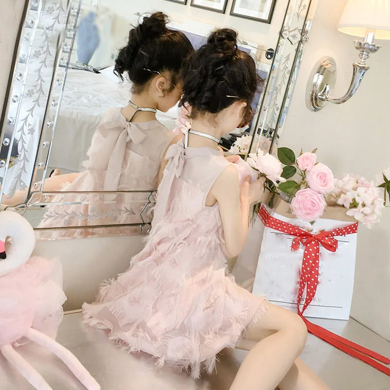 Girl's feather dress with bow at the back