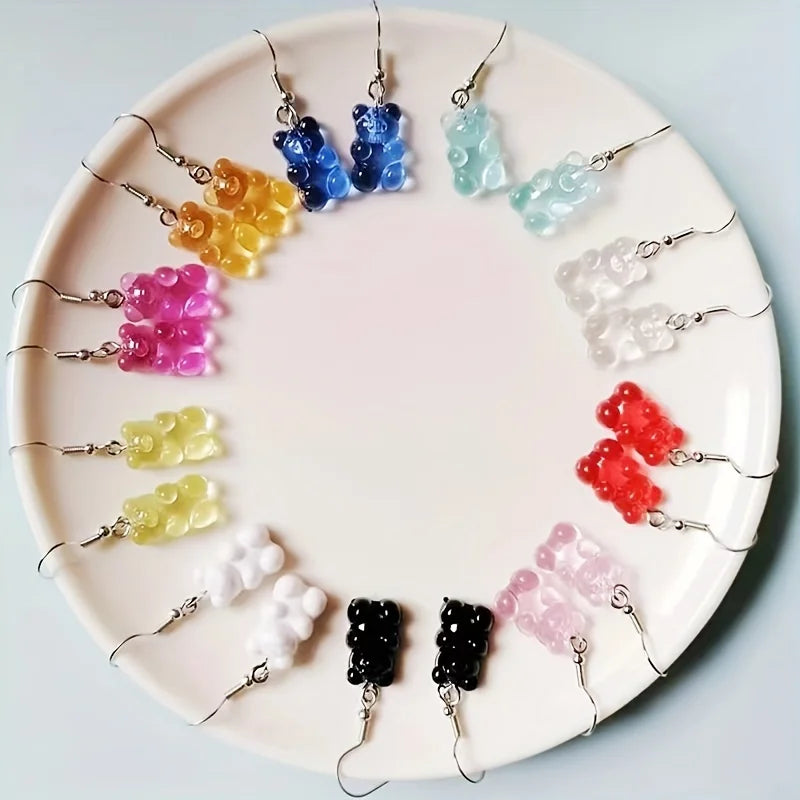 Set of 3 pairs of colorful transparent resin bear-shaped earrings, featuring a cute and playful design, perfect for adding a fun touch to any outfit. Ideal for those who love unique, whimsical accessories.