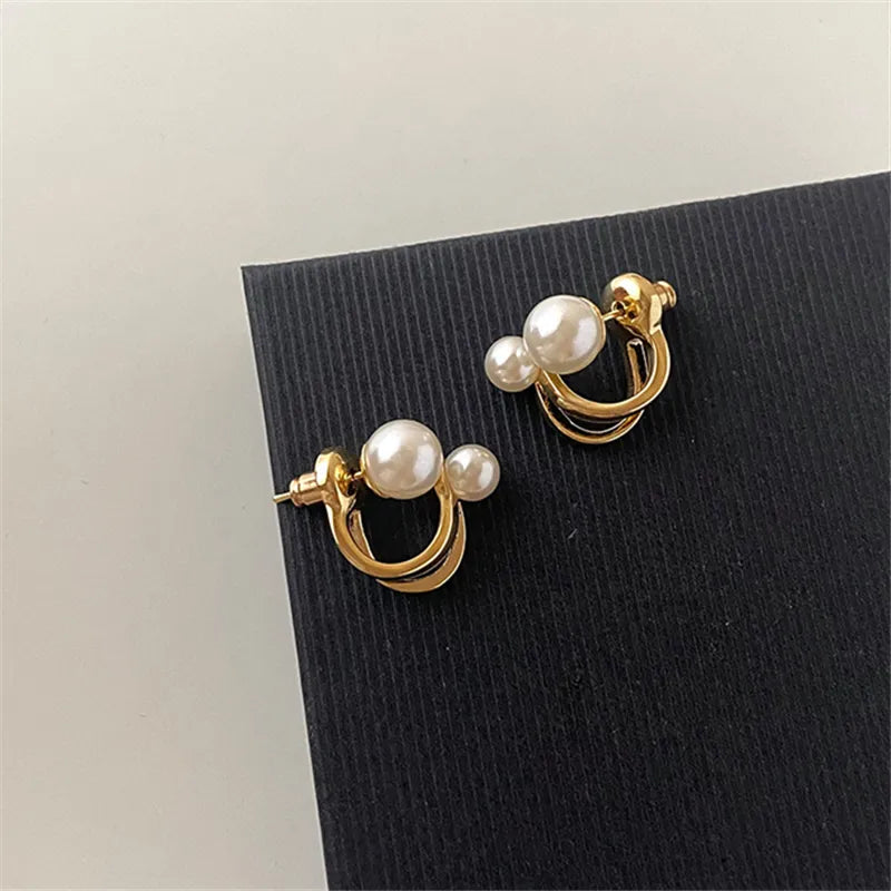 Imitation pearl earrings