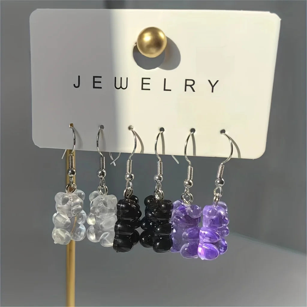 Set of 3 pairs of colorful transparent resin bear-shaped earrings, featuring a cute and playful design, perfect for adding a fun touch to any outfit. Ideal for those who love unique, whimsical accessories.