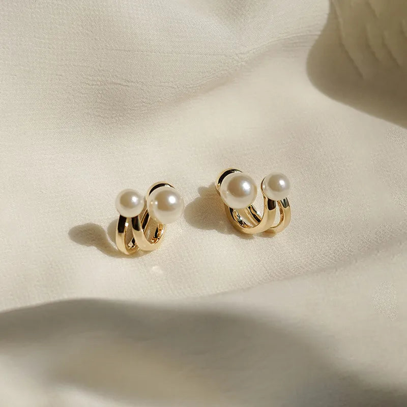 Imitation pearl earrings