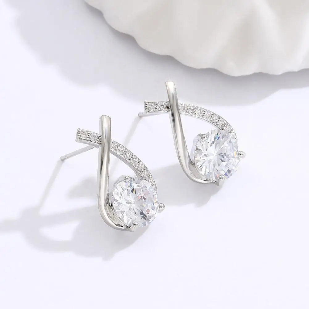 Boucles d'oreilles élégantes croisées en cristal