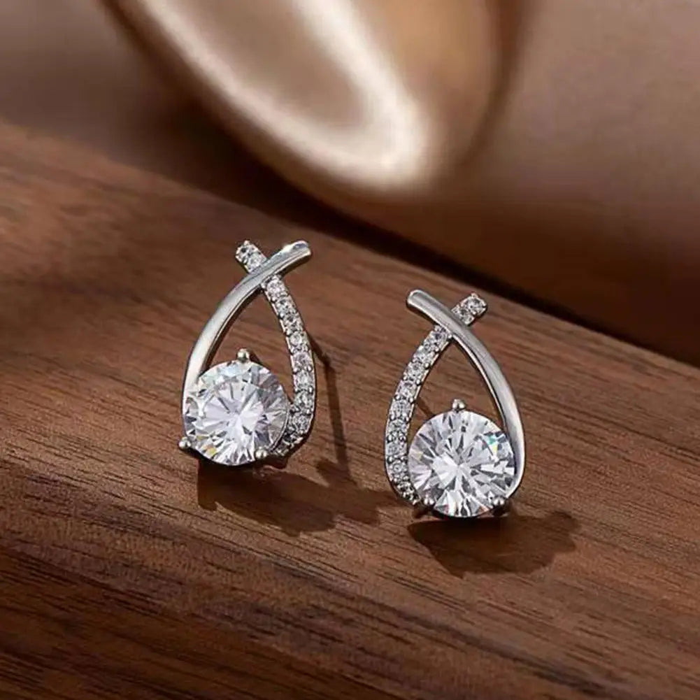 Boucles d'oreilles élégantes croisées en cristal