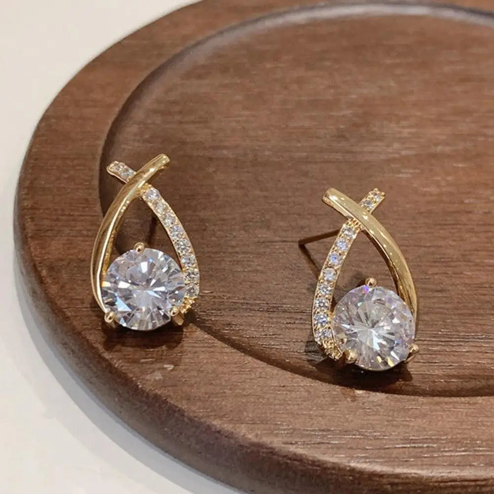 Boucles d'oreilles élégantes croisées en cristal